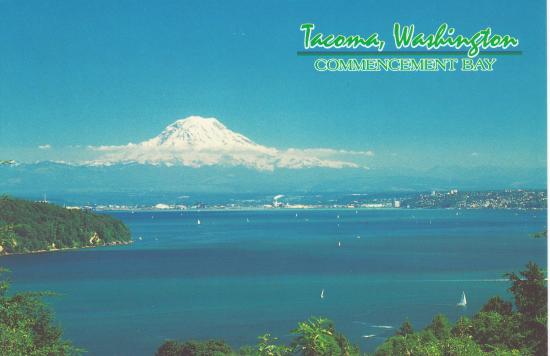 Mount Rainier rises above the city of Tacoma and Commencement Bay - Washington